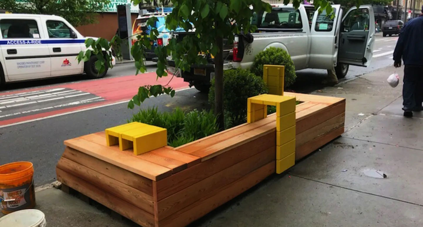 A Parklet around a tree made of wood